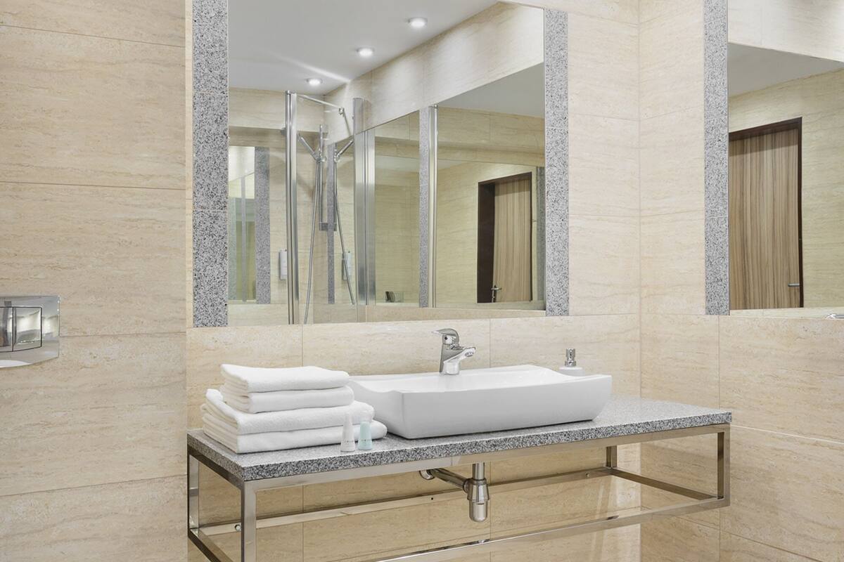 studio, 1 king bed | bathroom | free toiletries, hair dryer, slippers, towels