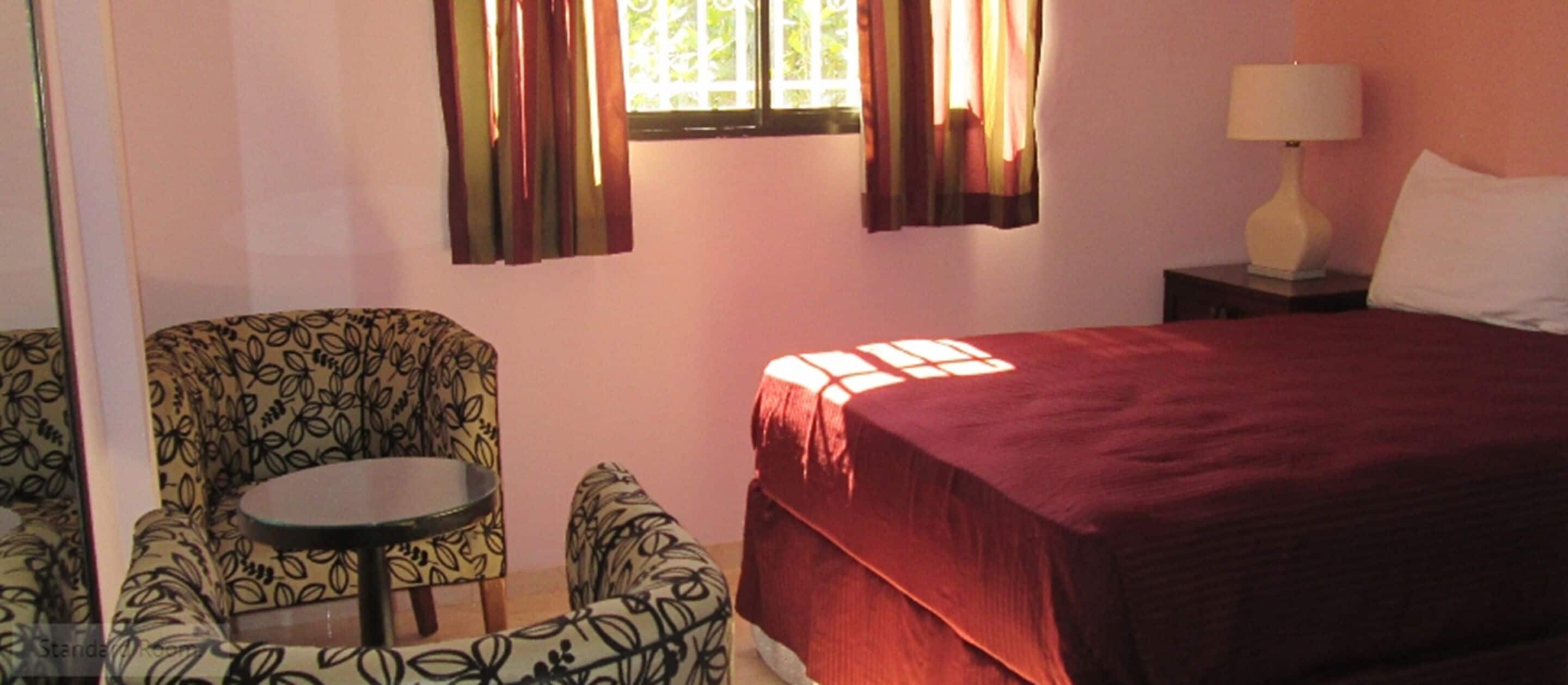 family room, 2 queen beds | premium bedding, desk, iron/ironing board, cots/infant beds