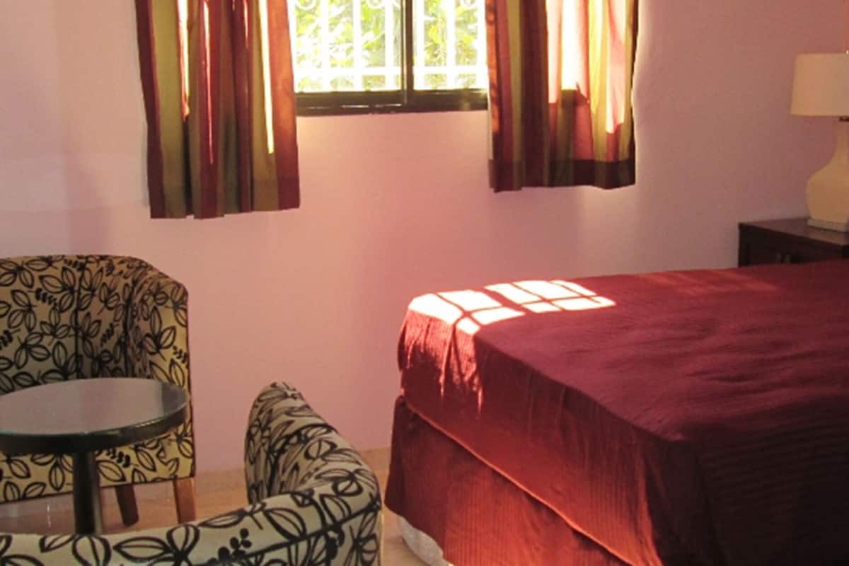 family room, 2 queen beds | premium bedding, desk, iron/ironing board, cots/infant beds