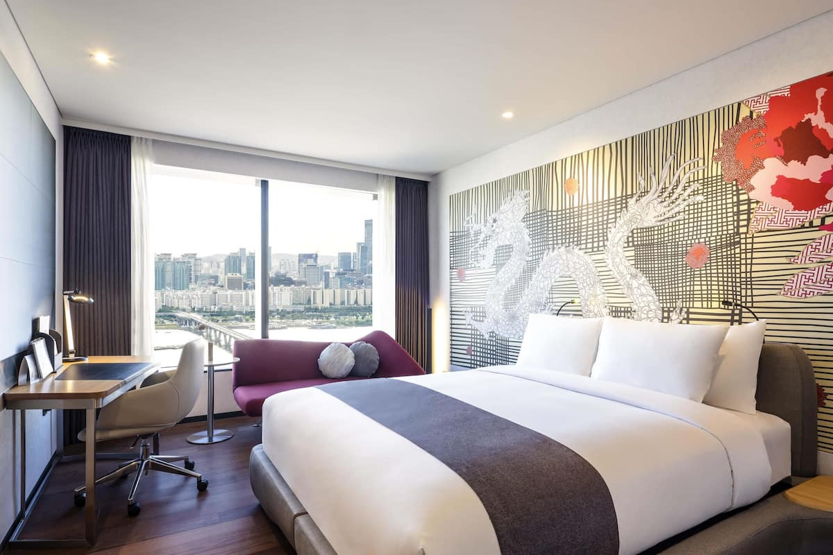 Premium bedding, down duvets, in-room safe, desk
