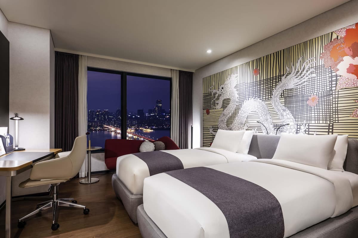 Premium bedding, down duvets, in-room safe, desk