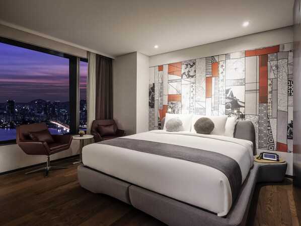 Premium bedding, down duvets, in-room safe, desk