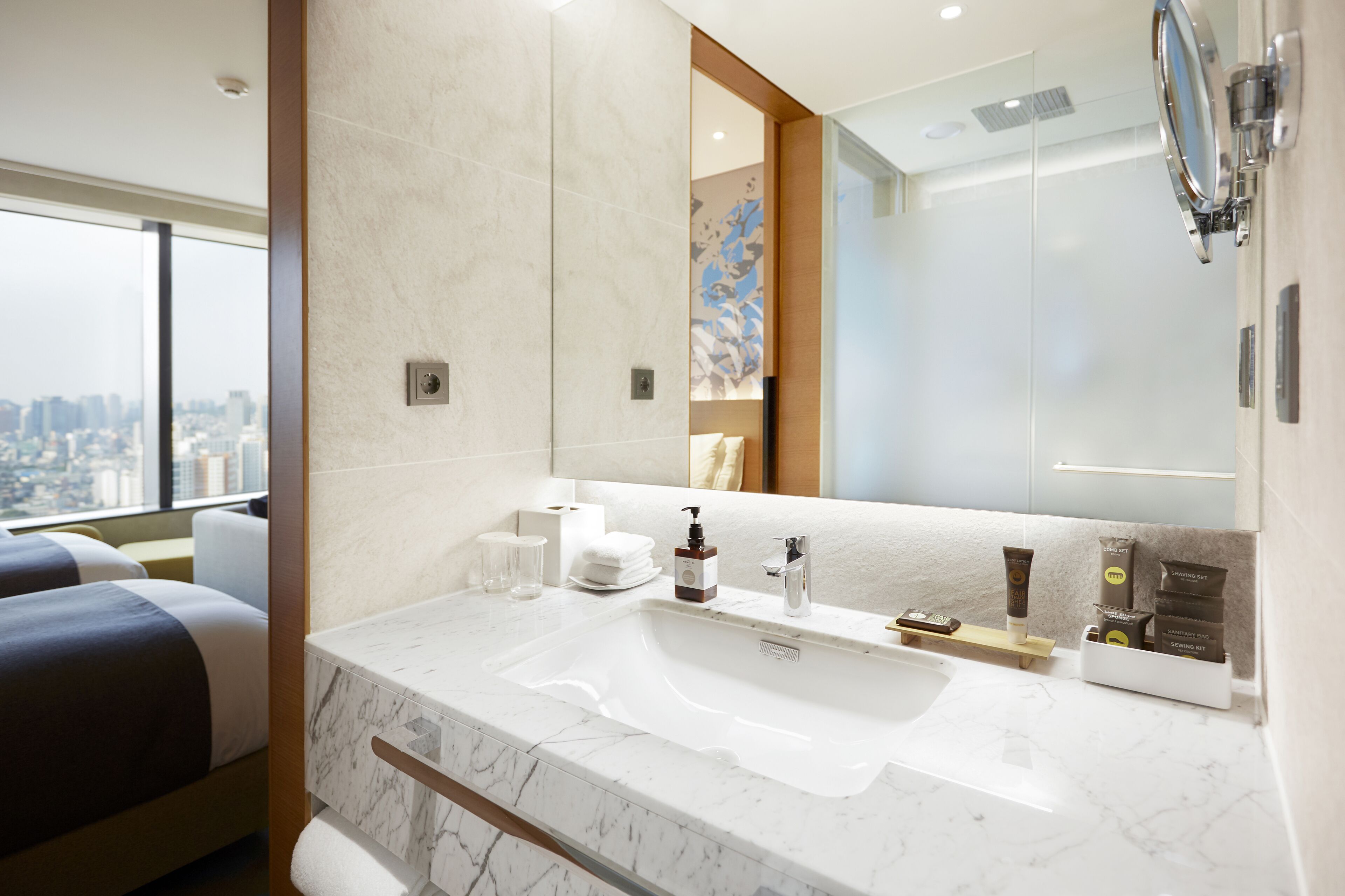 eco-friendly toiletries, hair dryer, bathrobes, slippers