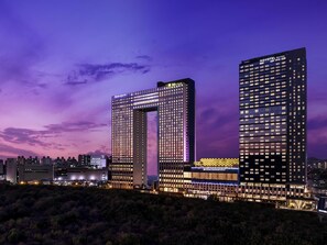 Two high-rise buildings with illuminated signage, one labeled 'Novotel Suites' and the other 'Grand Mercure.' - Novotel Suites Ambassador Seoul Yongsan - Seoul Dragon City (Seoul)
