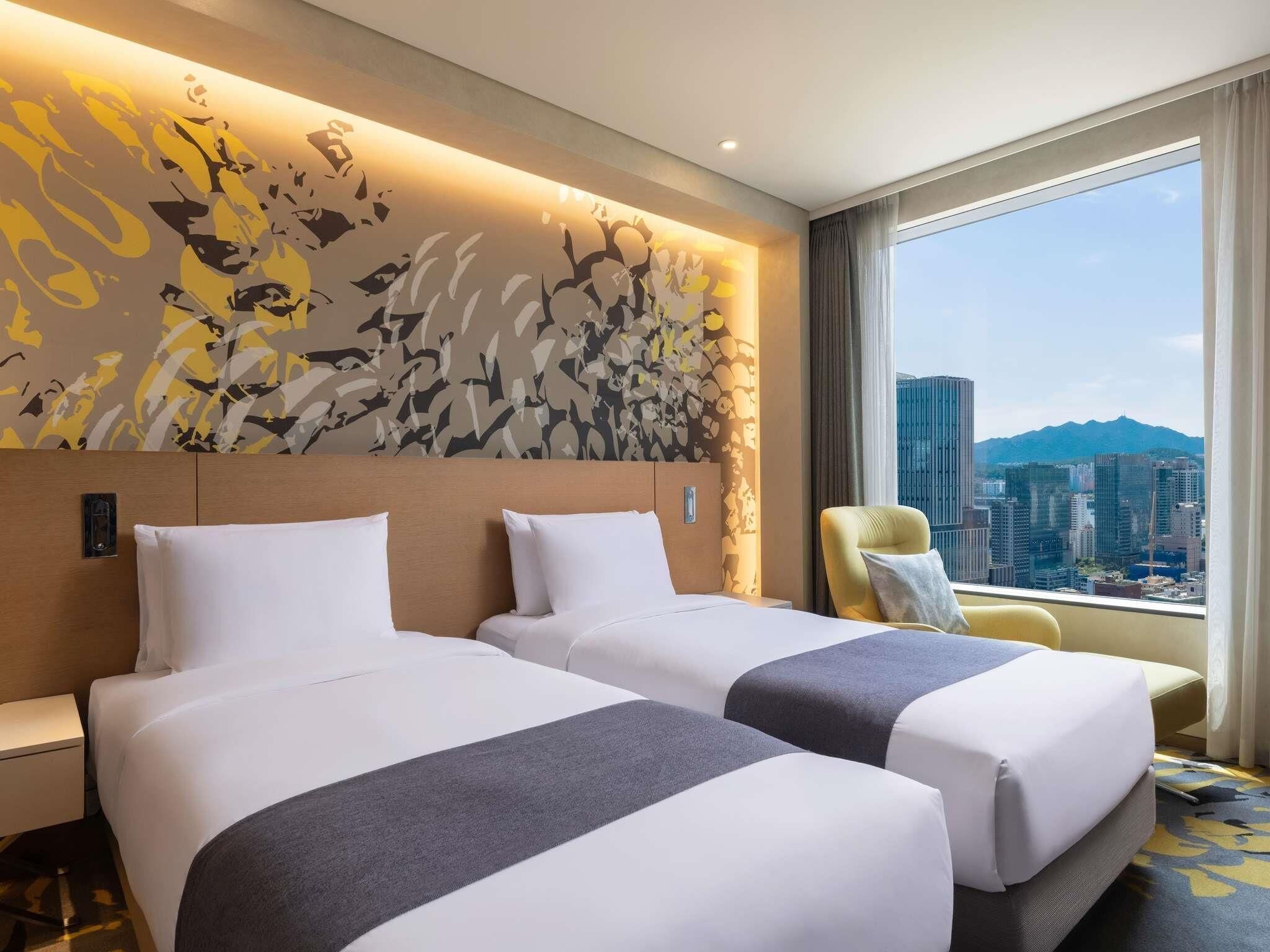 Deluxe Suite, 2 Twin Beds | Premium bedding, down comforters, in-room safe, individually decorated