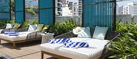 2 outdoor pools, open 6:00 AM to 6:00 PM, pool umbrellas, sun loungers