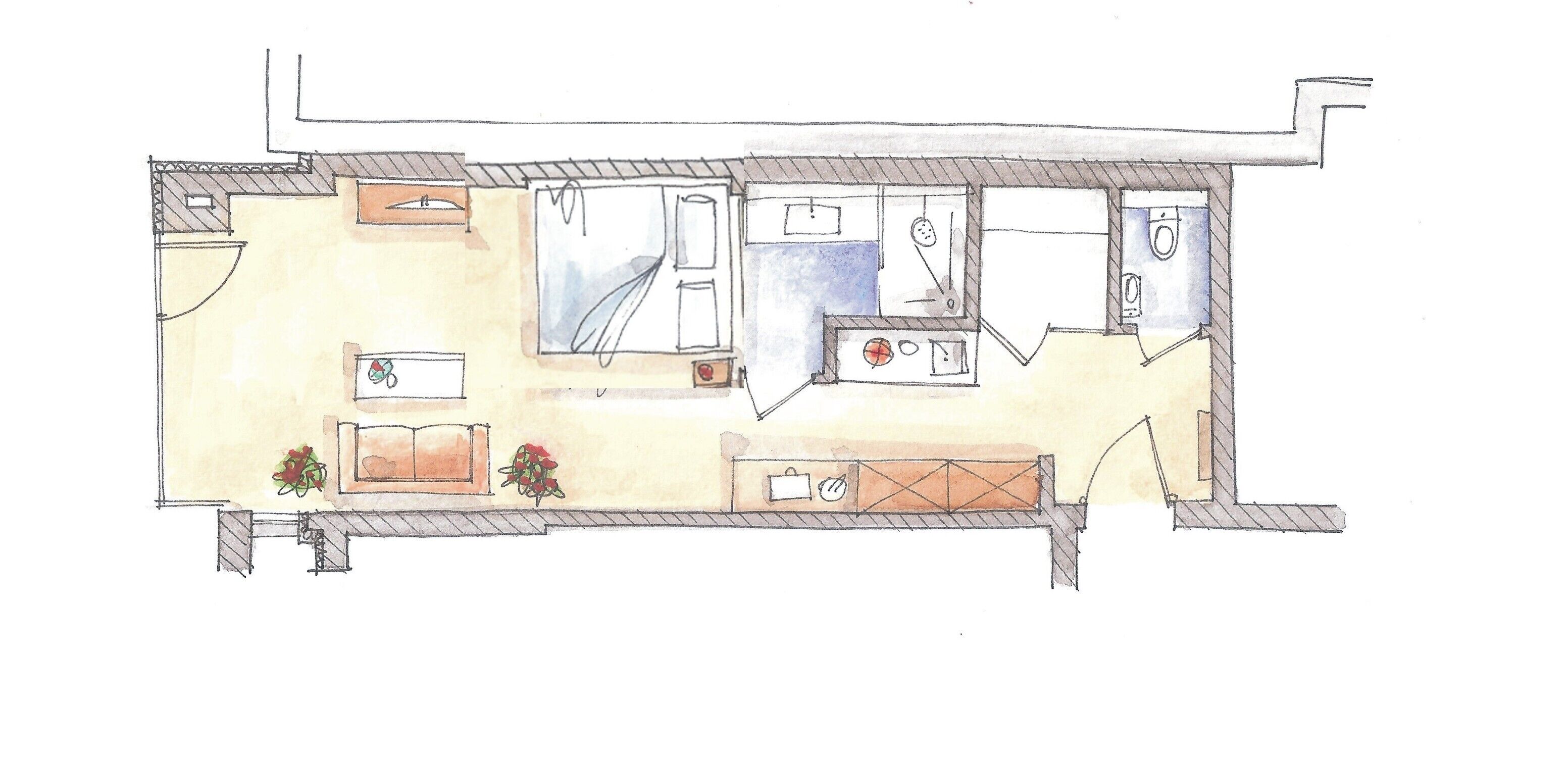 A floor plan of a hotel room with a bathroom, kitchenette, and a small sitting area.
