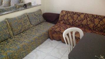 Apartment, 2 Bedrooms | Living room | Flat-screen TV