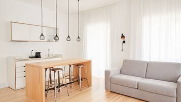 Appartement, 1 chambre | Coin séjour | Télévision à écran plat