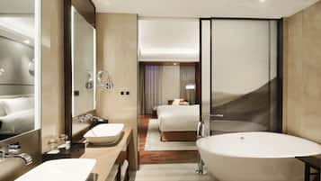 Suite, 1 King Bed, Club Lounge Access | Bathroom | Combined shower/tub, free toiletries, hair dryer, bathrobes