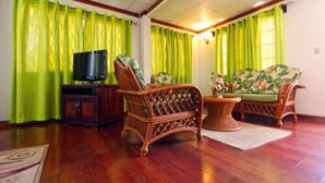 Suite exclusiva, 1 cama de matrimonio grande, baño privado | Zona de estar