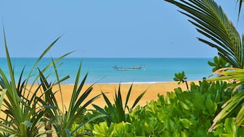 On the beach, sun-loungers, beach towels