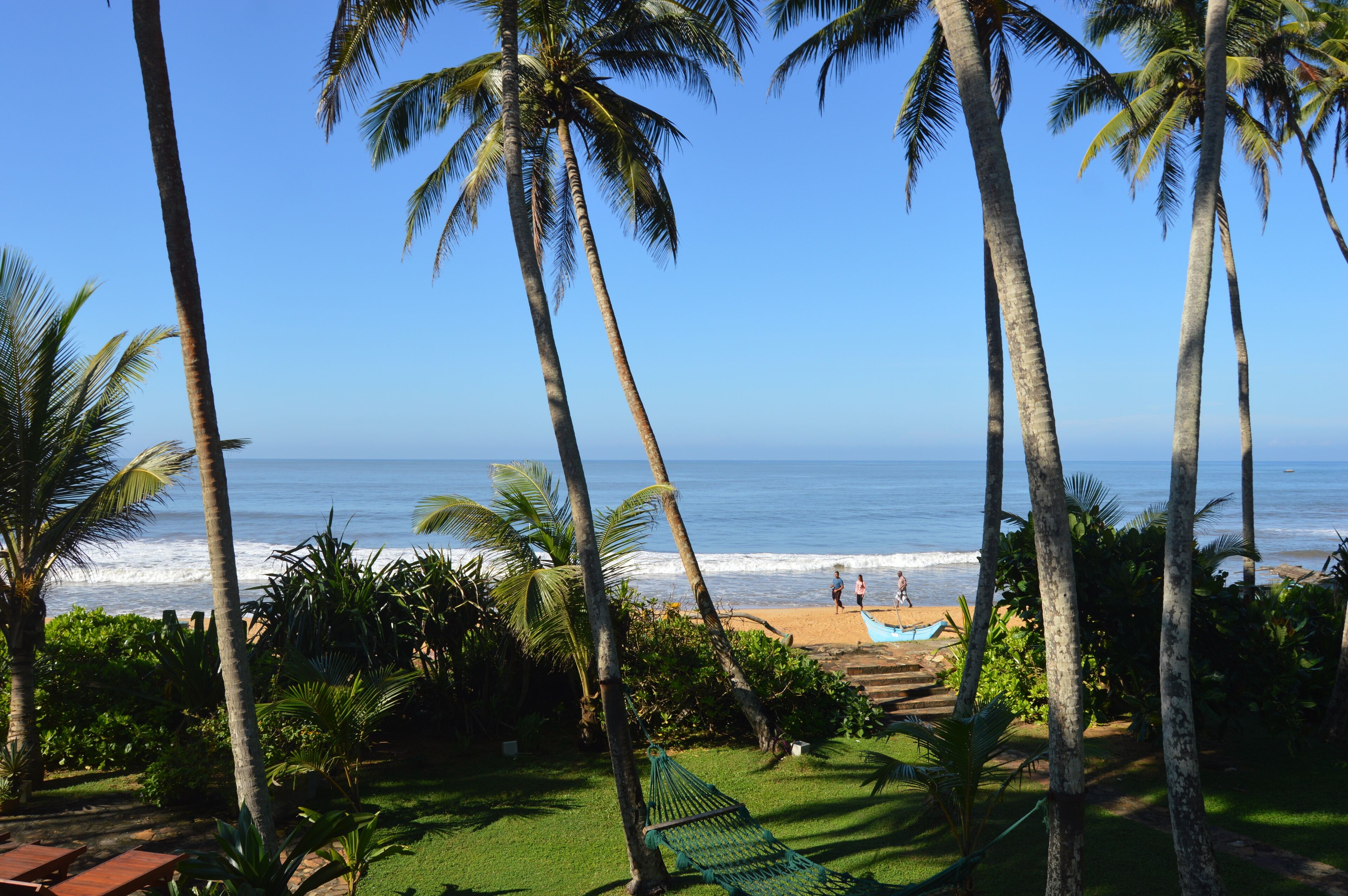 On the beach, sun-loungers, beach towels