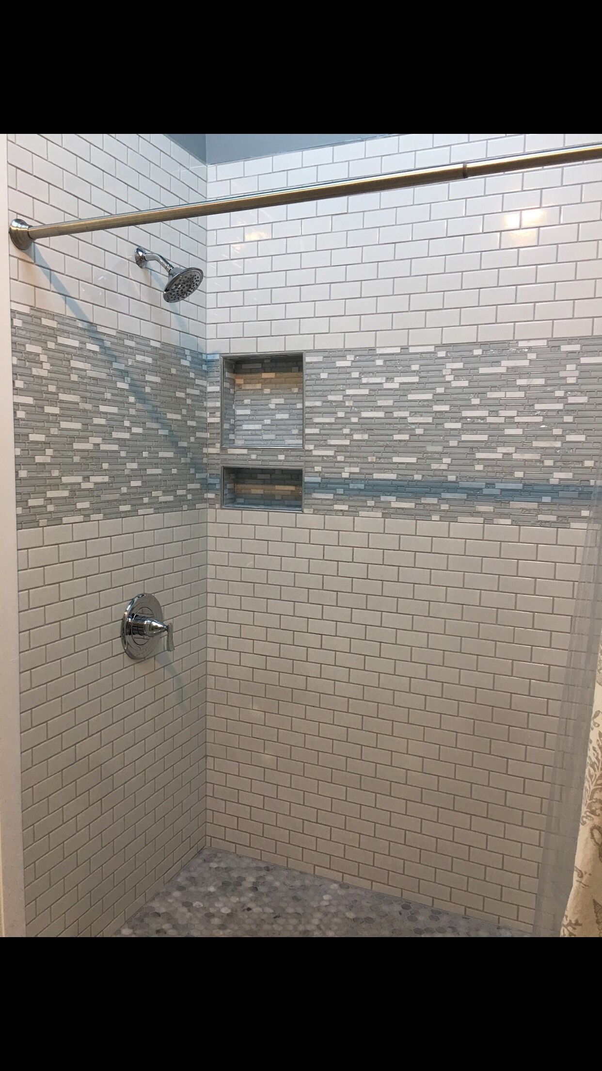 Combined shower/tub, hair dryer, soap, toilet paper