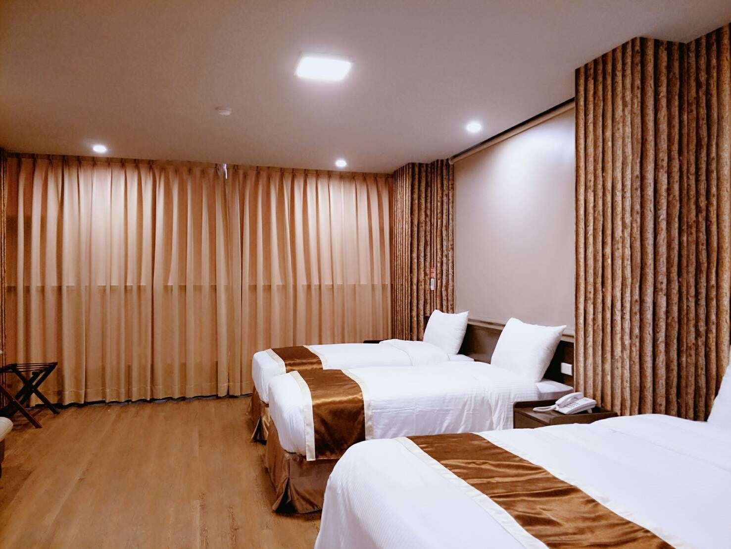 deluxe quadruple room | premium bedding, desk, soundproofing, free wifi