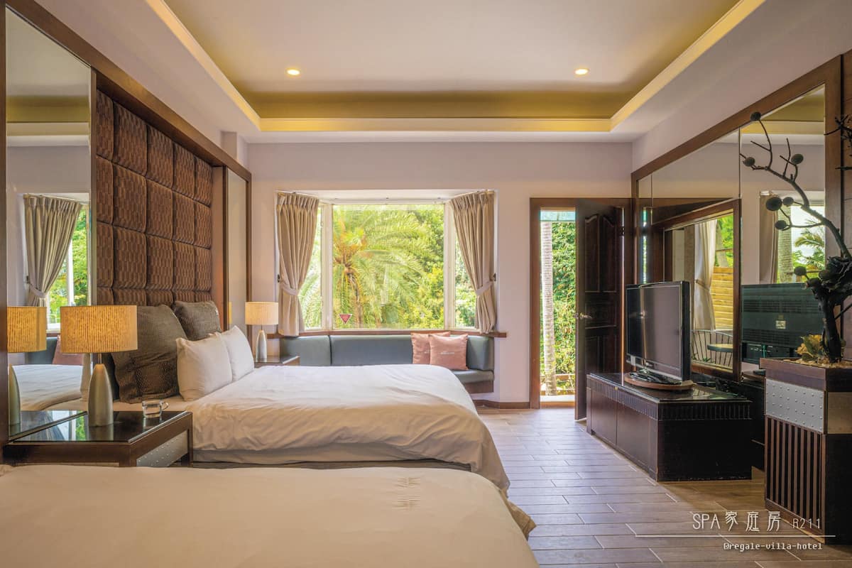 Family Quadruple Room, Multiple Beds | Premium bedding, down comforters, blackout drapes, soundproofing