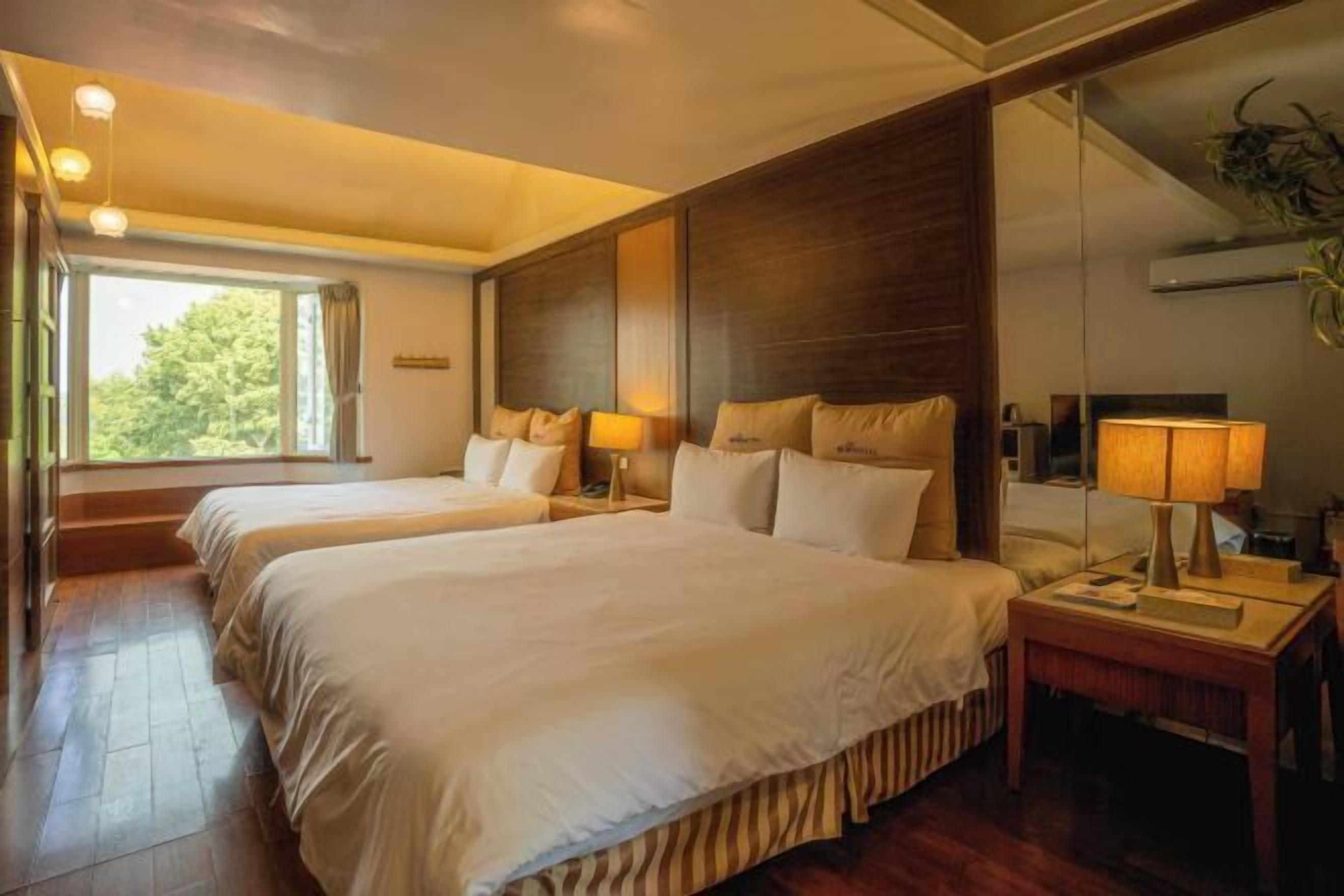 Premium bedding, down comforters, blackout drapes, soundproofing