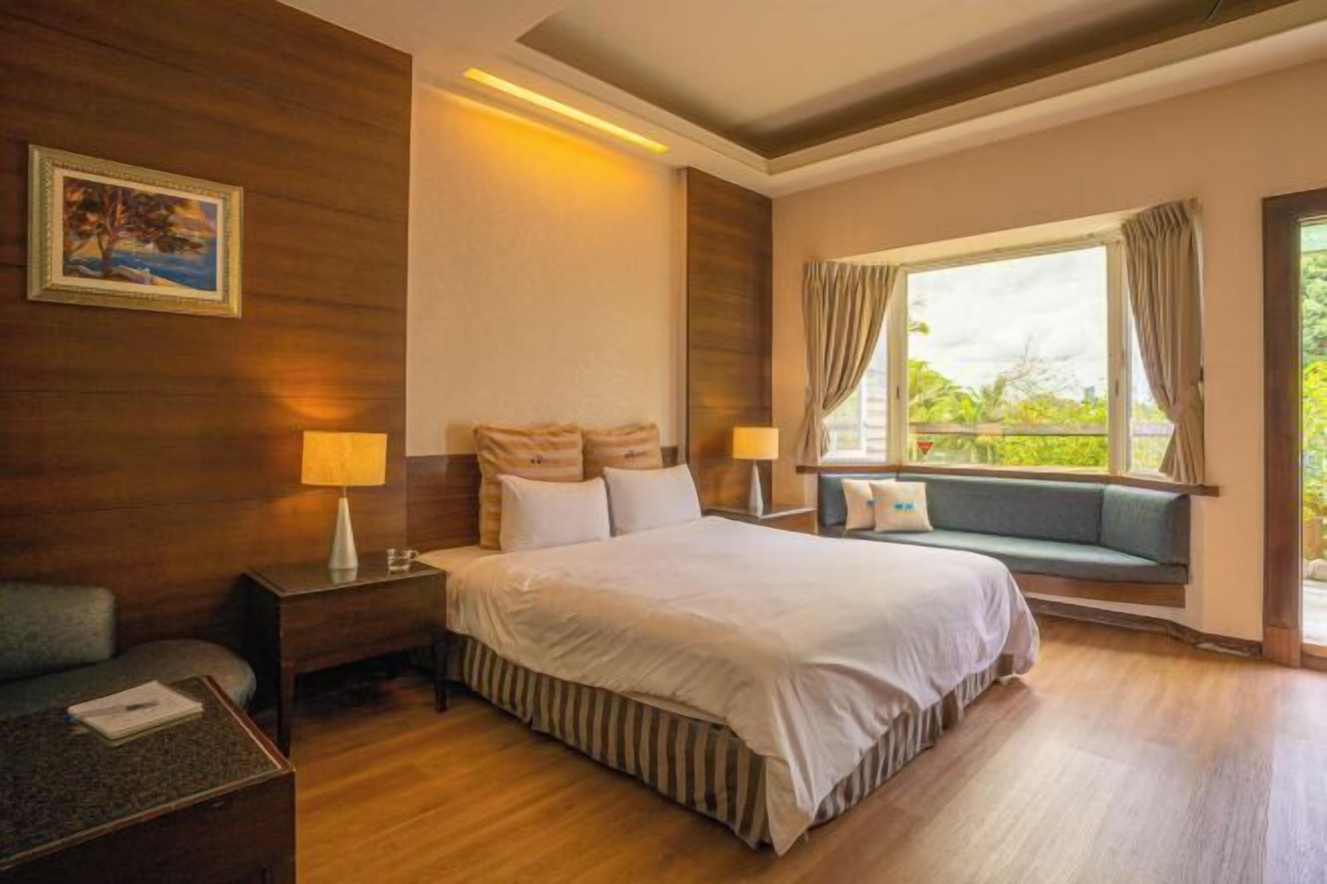 Premium bedding, down comforters, blackout drapes, soundproofing