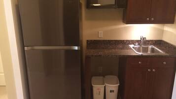 Microwave, coffee/tea maker, toaster, cookware/dishes/utensils