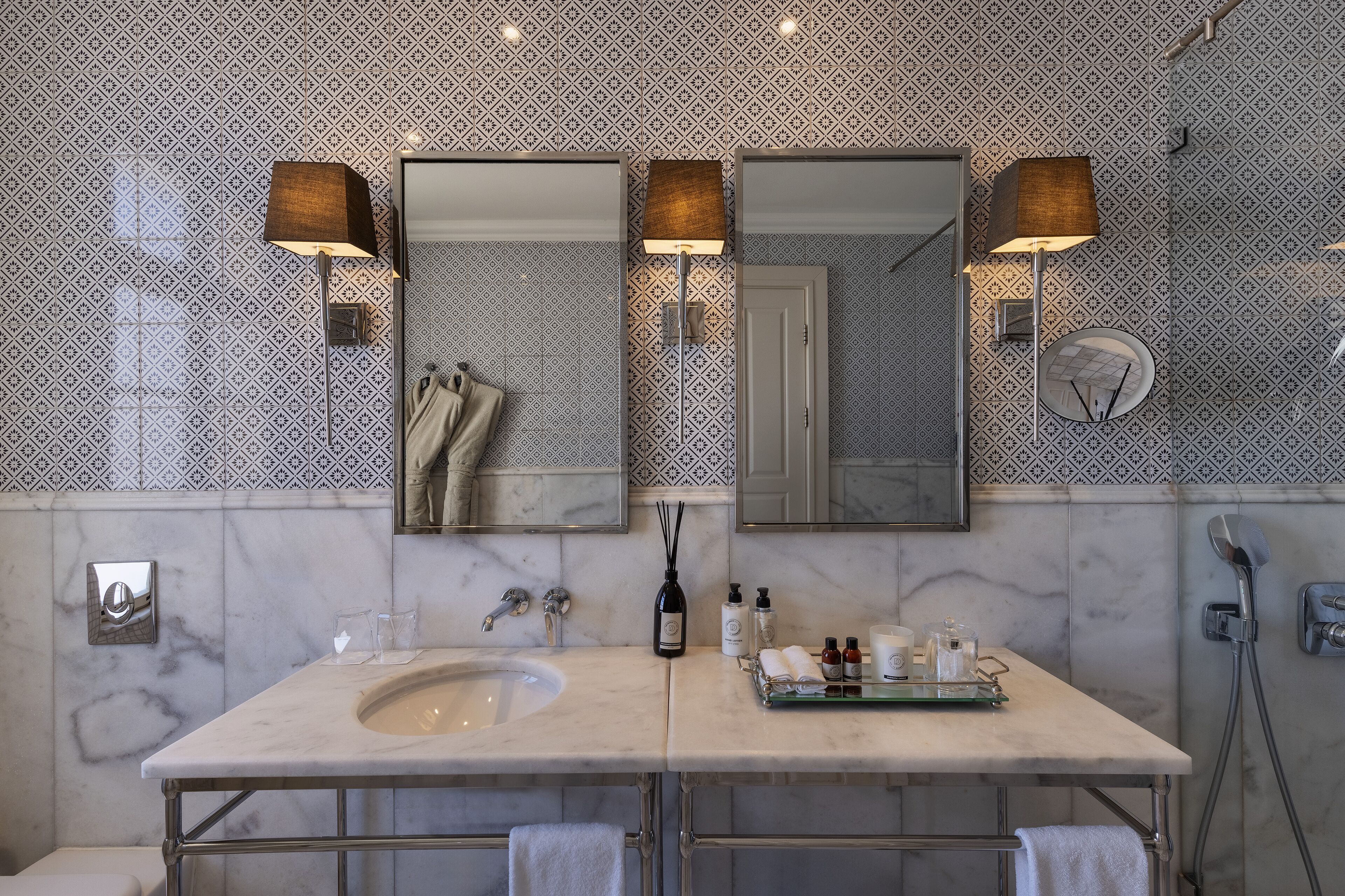 luxury one bedroom suite with terrace | bathroom | designer toiletries, hair dryer, bathrobes, slippers