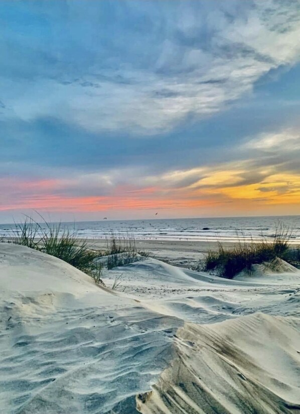 On the beach, sun-loungers, beach towels
