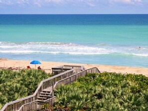On the beach, sun-loungers, beach towels
