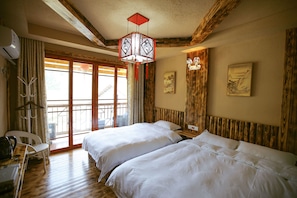 Family Room with Balcony | Premium bedding, blackout curtains, soundproofing, free WiFi - National Park MINI Inn - Yangjiajie (Zhangjiajie)