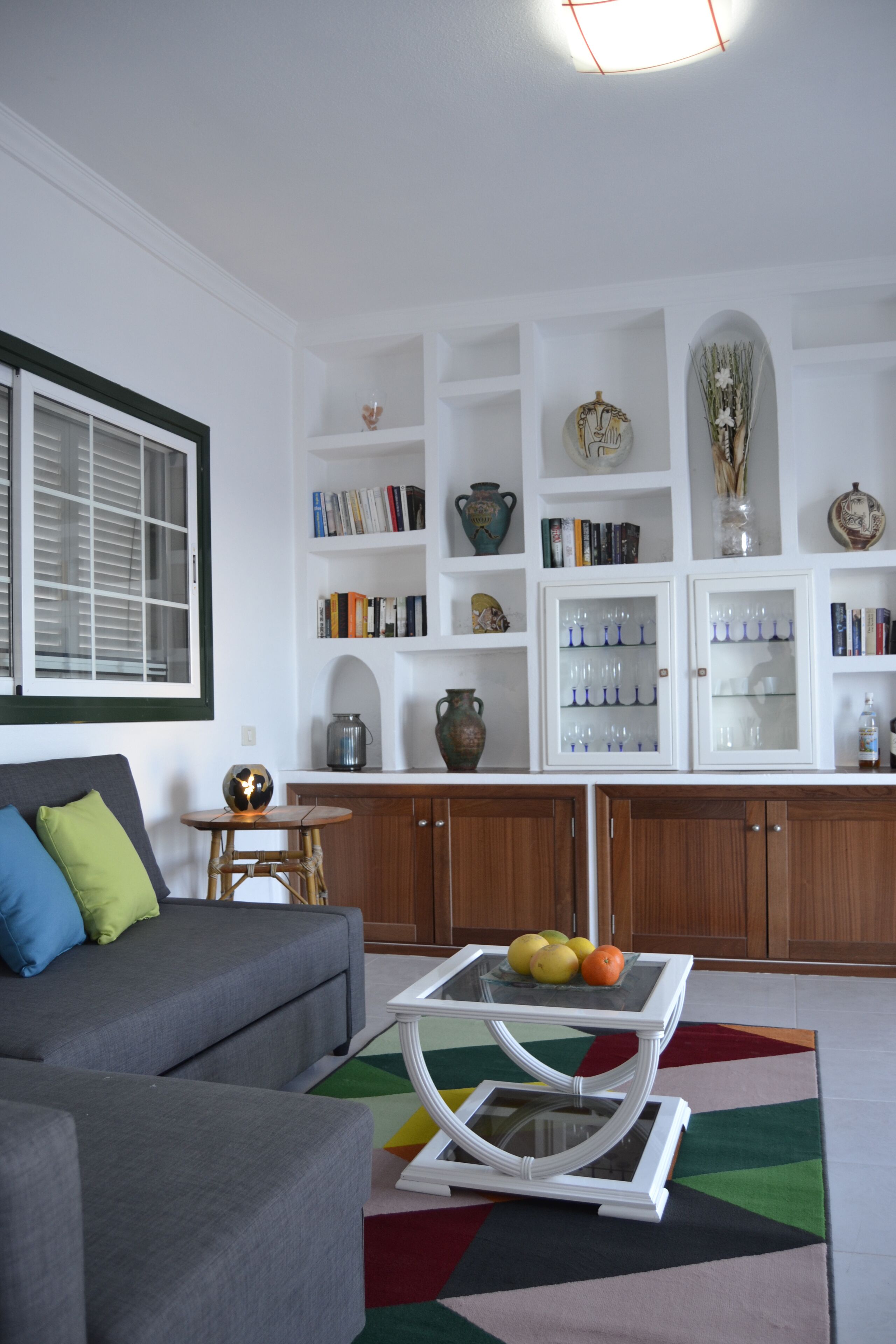 TV, fireplace, books