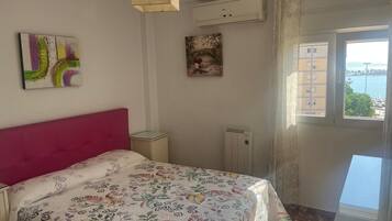 3 dormitorios, tabla de planchar con plancha, wifi y ropa de cama