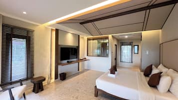 Villa, 1 King Bed, Beachfront | Minibar, in-room safe, desk, laptop workspace