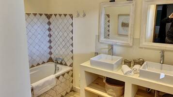 Bathtub, hair dryer, towels