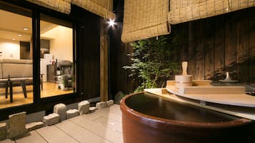Separate tub and shower, free toiletries, hair dryer, slippers