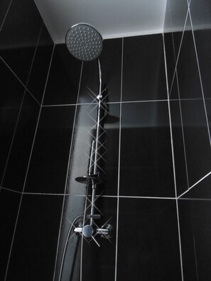 Bathtub, hair dryer, towels