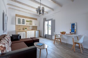 Apartment, Jetted Tub (Nektar) | Living area | 32-inch flat-screen TV with satellite channels, TV