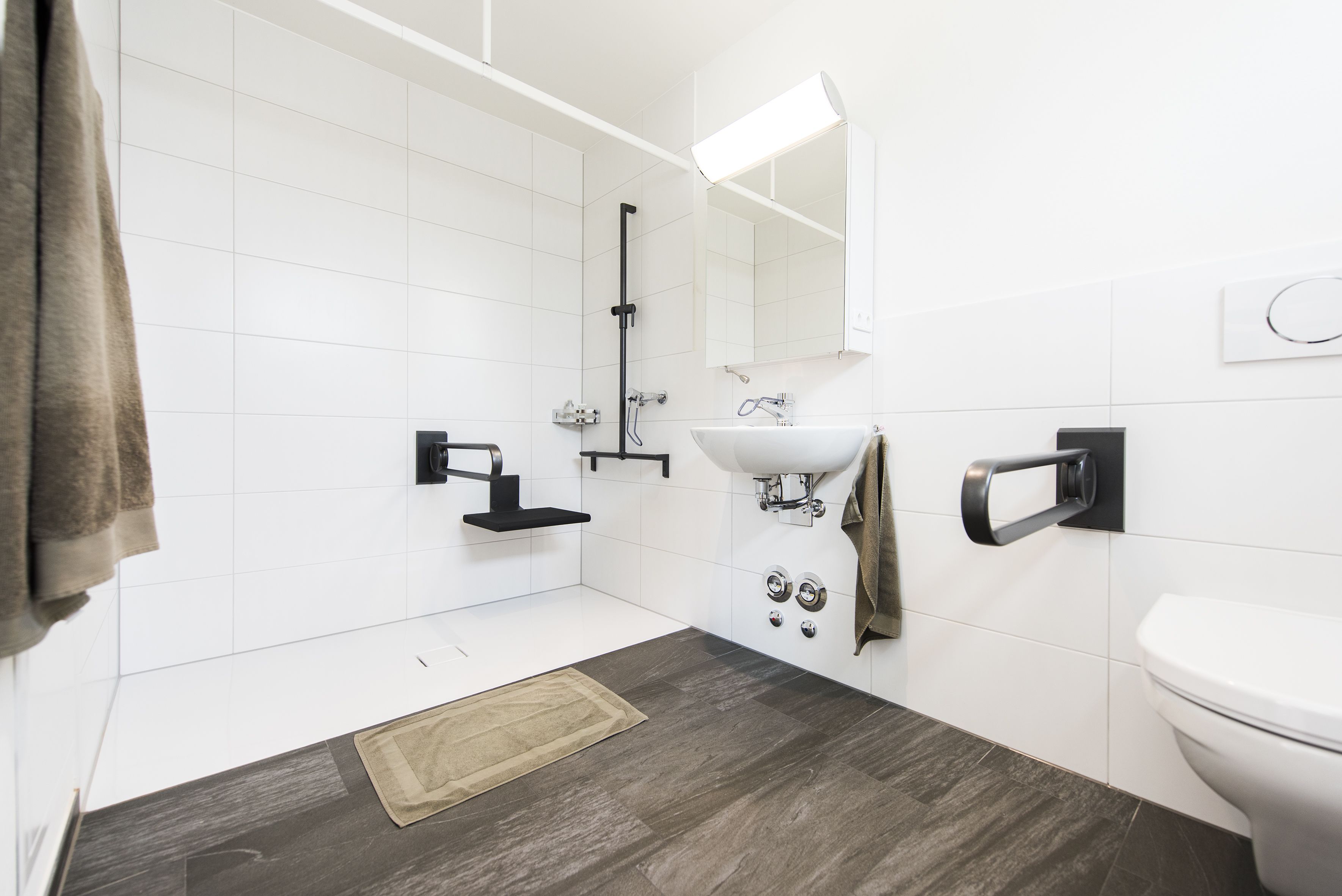 single room | bathroom | shower, hair dryer, towels, soap