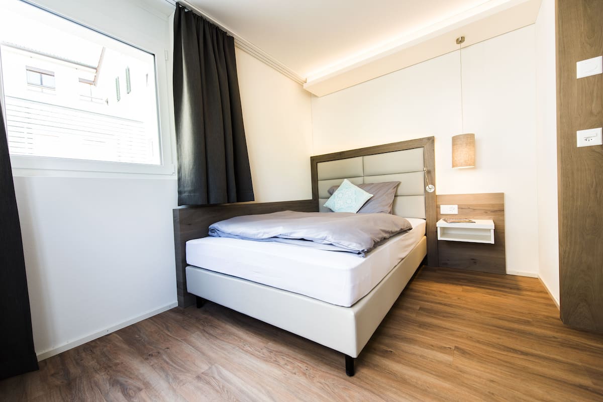 Family Room, 2 Bedrooms | Desk, laptop workspace, soundproofing, WiFi (free)