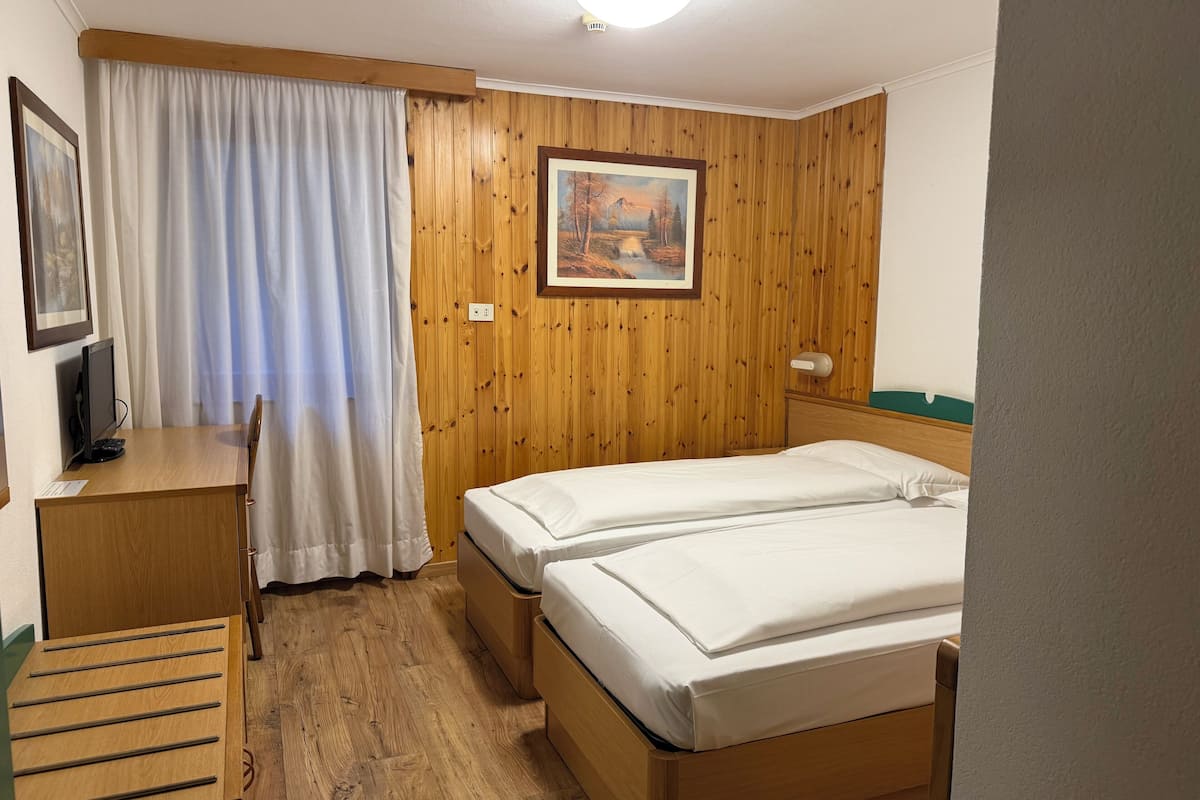 Double or Twin Room, 1 Double or 2 Single Beds | In-room safe, desk, free WiFi, bed sheets