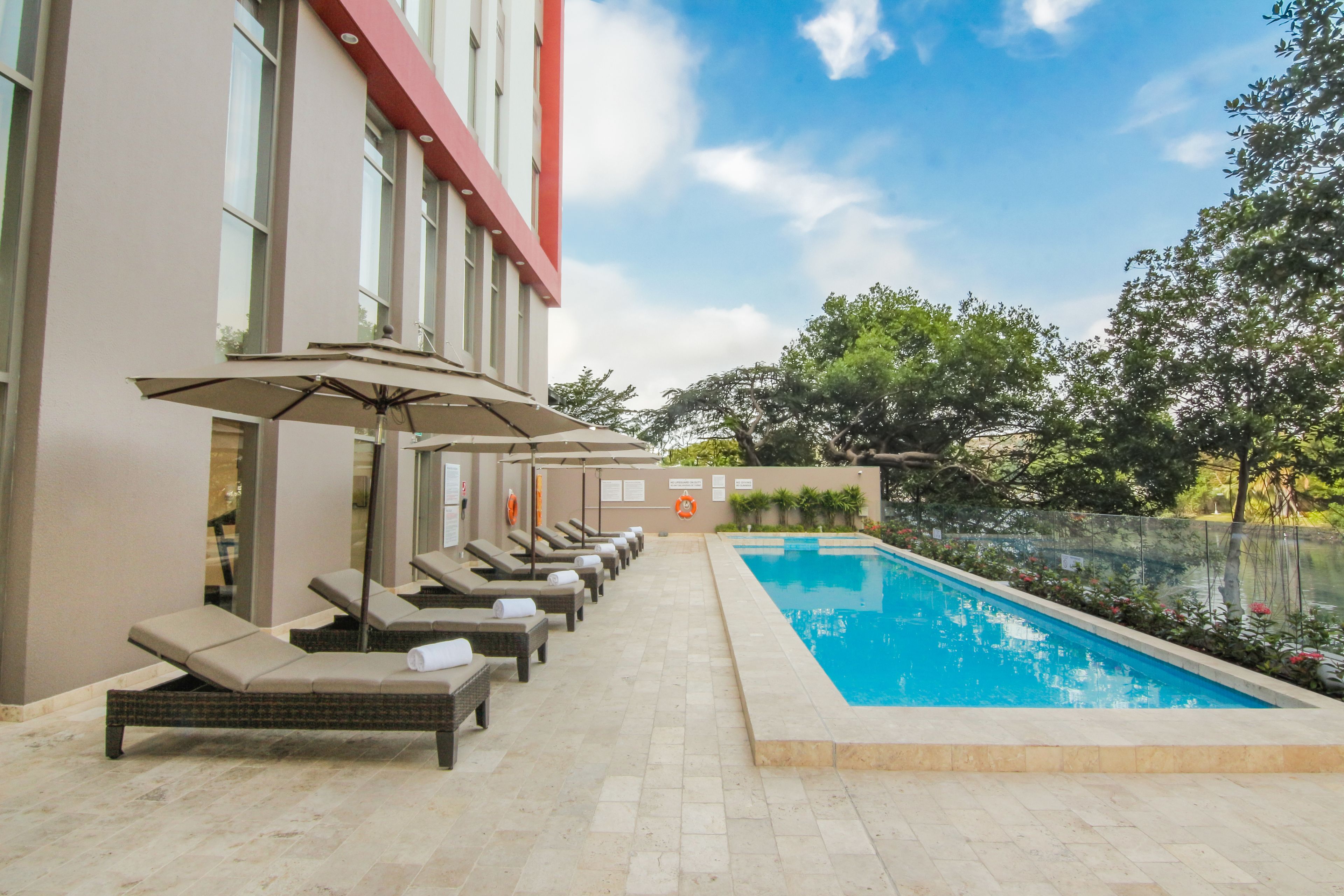 outdoor pool, pool loungers