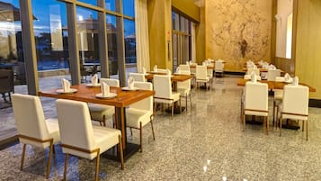 Breakfast, lunch, dinner served; local cuisine