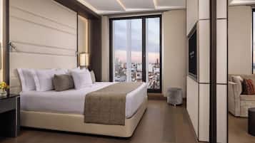 Premium bedding, down comforters, pillowtop beds, minibar
