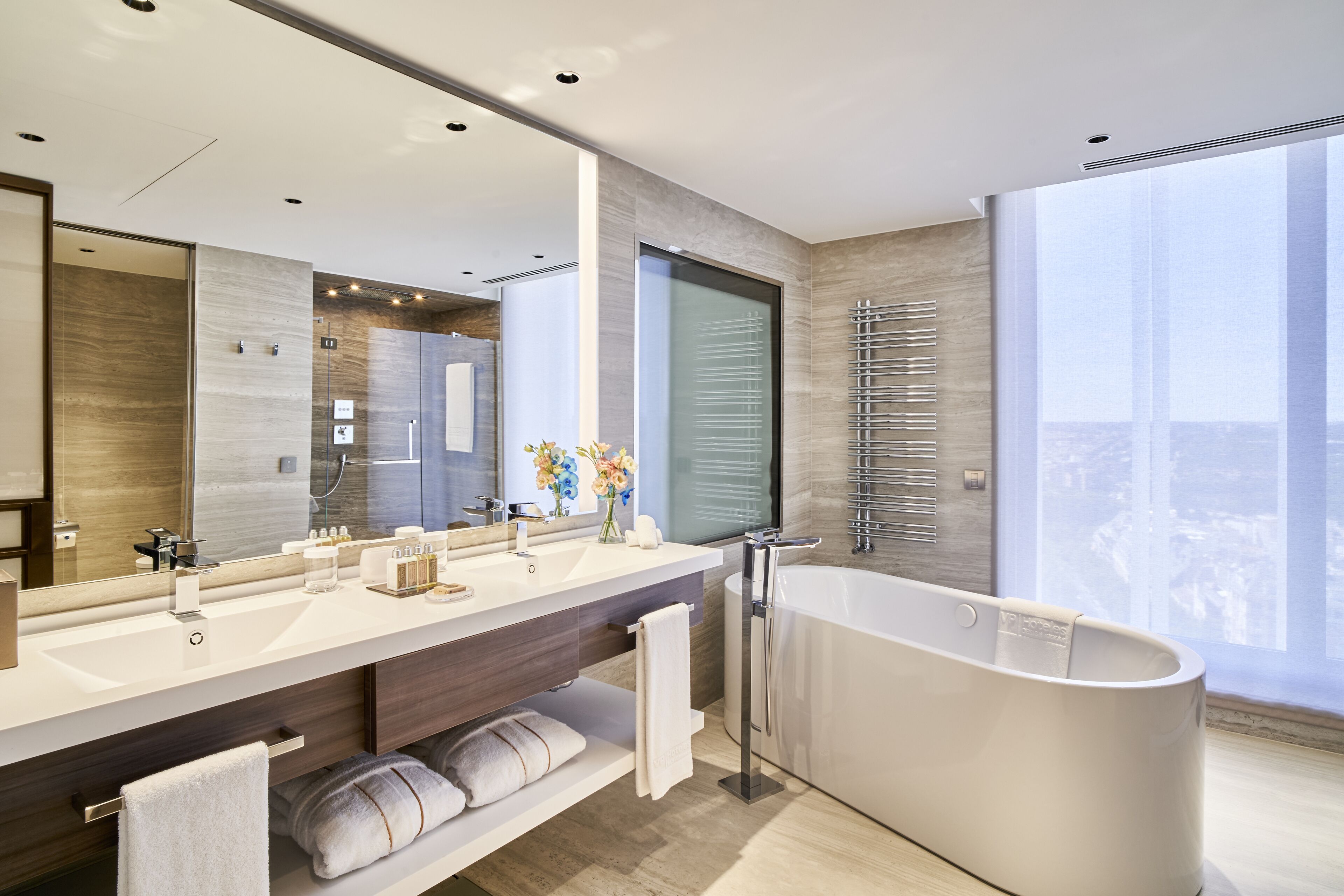 presidential suite | bathroom | combined shower/bathtub, hair dryer, bathrobes, slippers