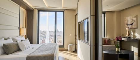 Premium bedding, down comforters, pillowtop beds, minibar