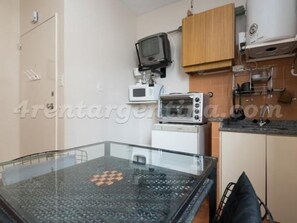 Full-size fridge, microwave, cookware/dishes/utensils