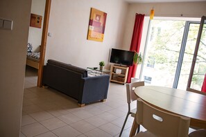 Premium Suite, City View | Living area | Flat-screen TV - Modern & cozy apartment close to Center (Prague)