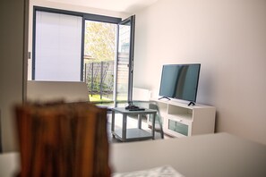 Premium Apartment, Terrace, Garden View | Living area | Smart TV, Netflix