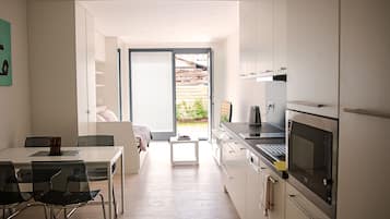 Apartamento premium, terraço, vista para o jardim | Área de estar | Smart TV, Netflix