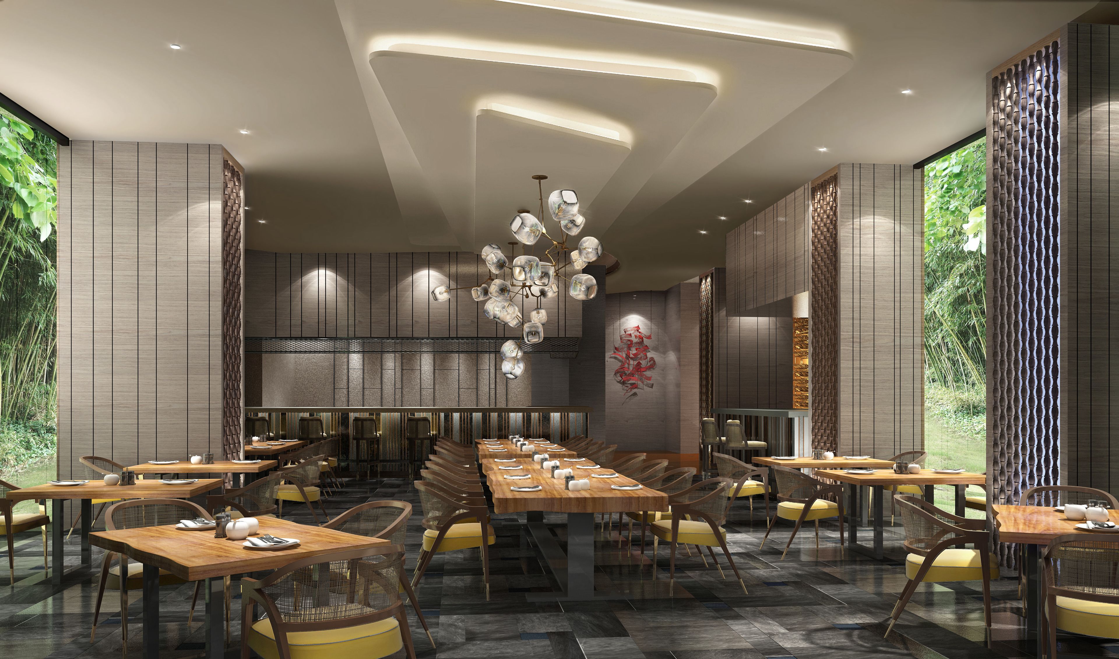Un restaurante moderno con una larga mesa común, mesas individuales y un candelabro único.