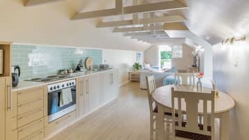 Loft Apartment | Private kitchen | Fridge, coffee/tea maker