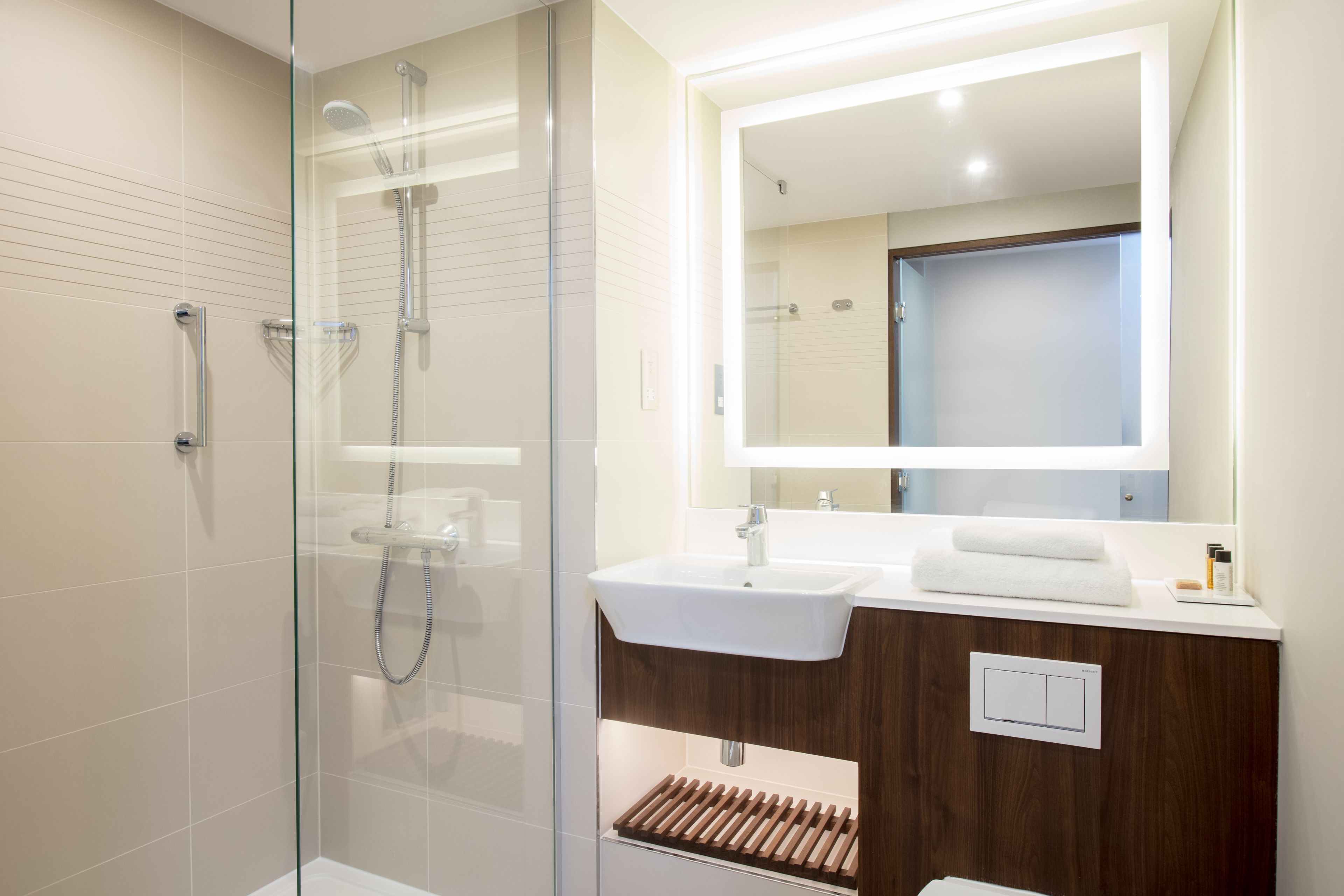 shower, free toiletries, hair dryer, towels