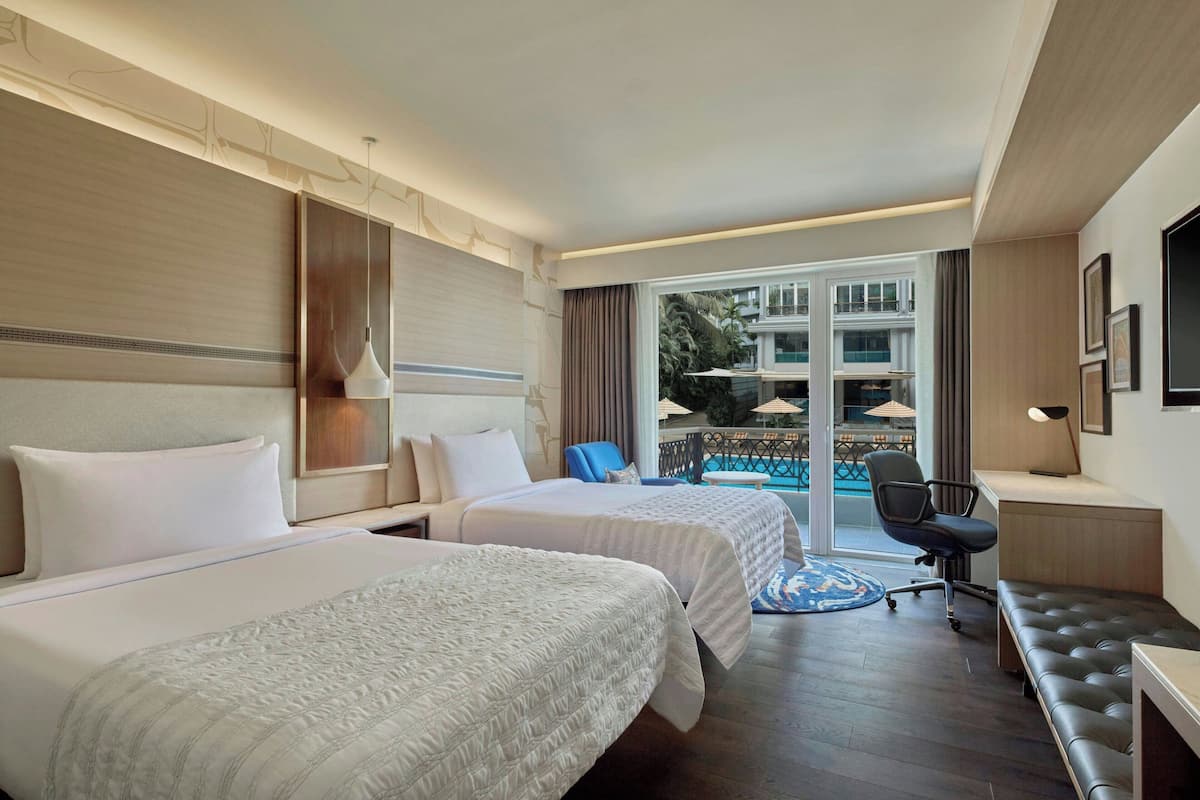 Classic Room, 2 Queen Beds, Pool View (Balcony) | Pool | Outdoor pool, open 8:00 AM to 8:00 PM, pool umbrellas